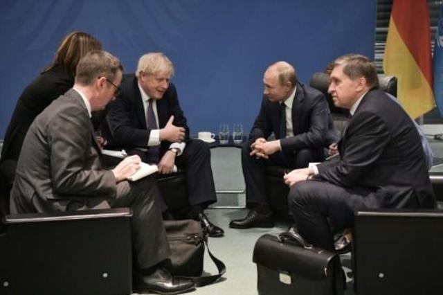 رئيس الوزراء البريطاني بوريس جونسون والرئيس الروسي