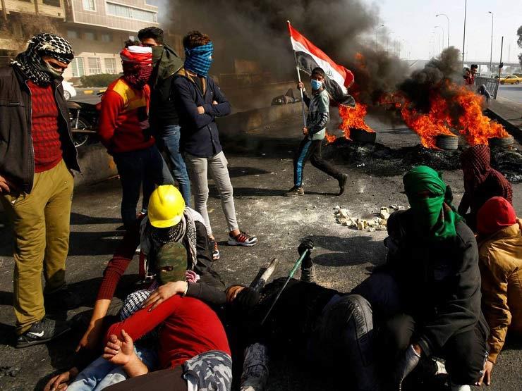 اشتباكات بين المتظاهرين وأنصار الصدر
