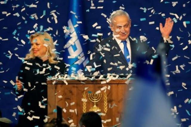 رئيس الوزراء الإسرائيلي بنيامين نتانياهو وإلى جانب
