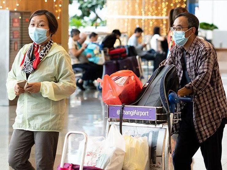 سنغافورة تشدد الإجراءات الاحترازية لمكافحة فيروس ك