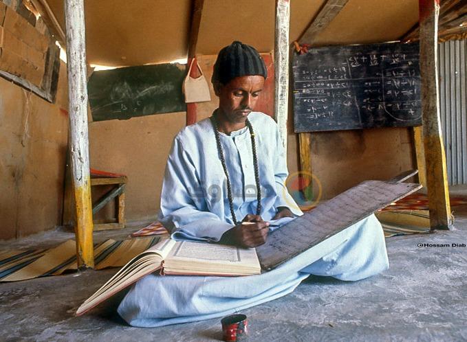 كتابة القرآن على خشب في مرسى علم عام 1983
