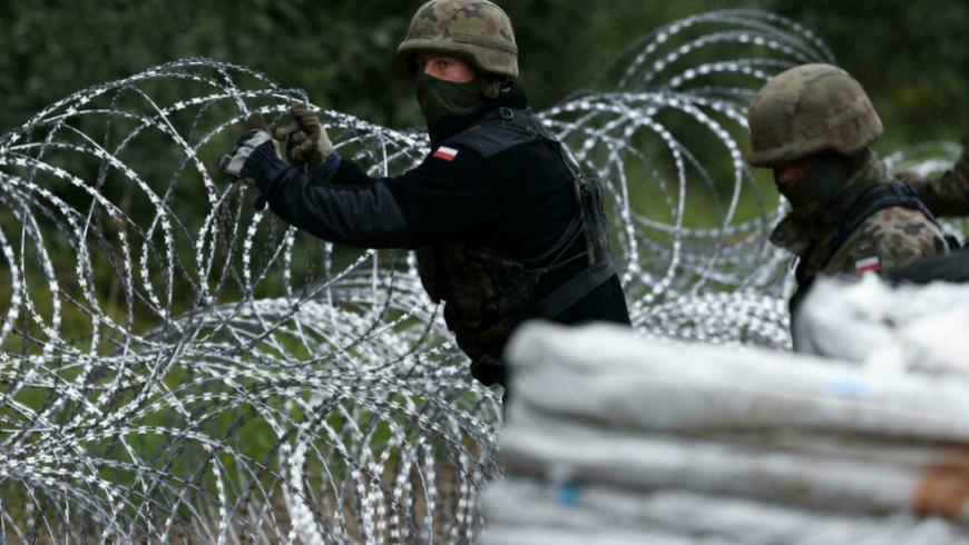 بولندا تعتزم بناء جدار حدودي لمنع دخول مهاجرين من 