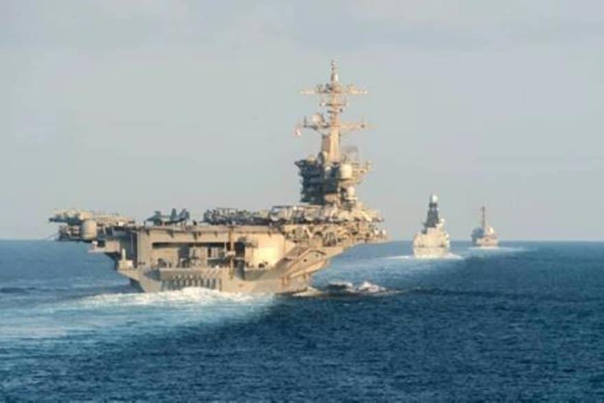  صورة نشرتها البحرية الأميركية لعبور مجموعة حاملة 