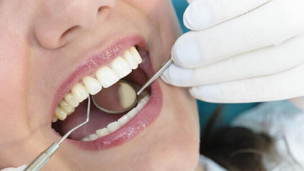 علاج الأسنان                                      