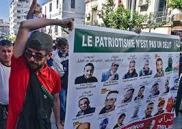 لقطة من تظاهرة دعما لناشطين مسجونين في الجزائر