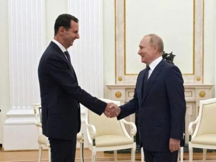 الرئيس الروسي فلاديمير بوتين مستقبلا نظيره السوري 