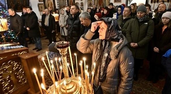 أوكرانيون أرثوذكس يحتفلون بالميلاد في ديسمبر تحديا