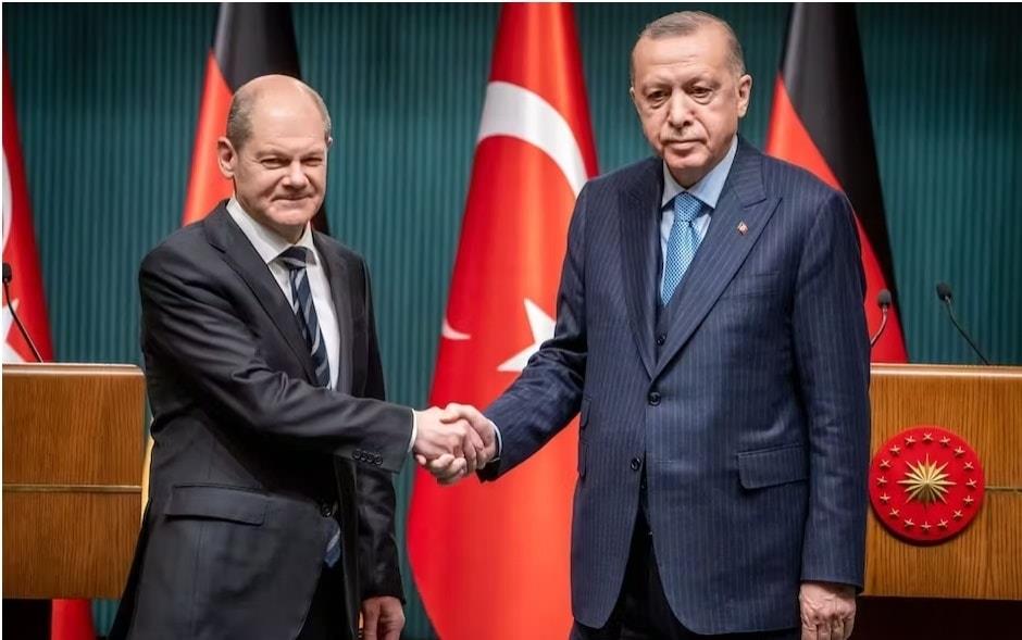 الرئيس التركي اردوغان والمستشار الألماني