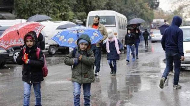حماية المعلمين والطلاب من الأمطار