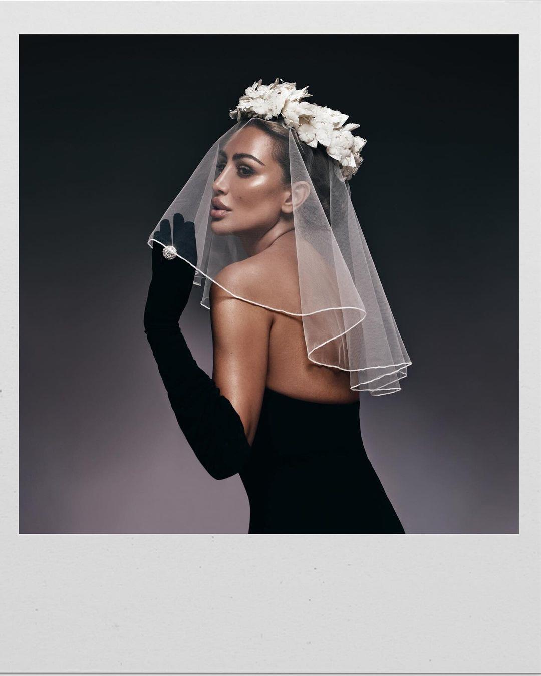 صور.. مايا دياب تثير الجدل بـ طرحة زفاف والجمهور يعلق