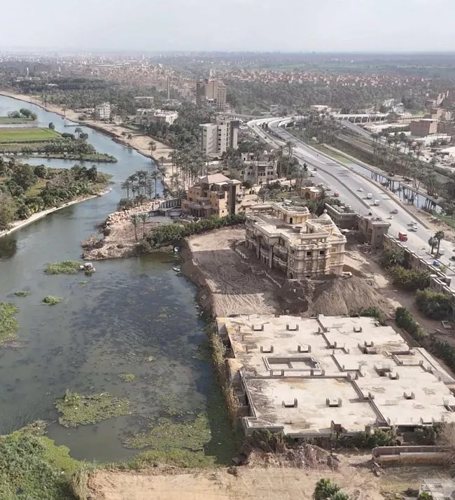  إزالة منشآت أكمل قرطام المخالفة على نهر النيل