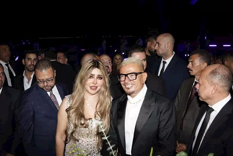 إيمان أبو طالب مع عمرو دياب