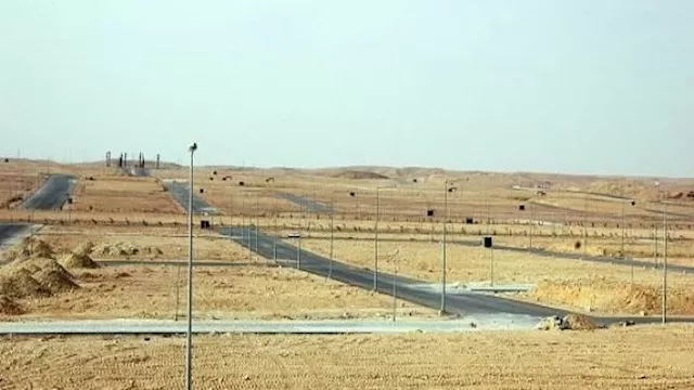 تسليم قطع أراضي بيت الوطن