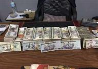 ضبط تاجري عملة - ارشيفية                          