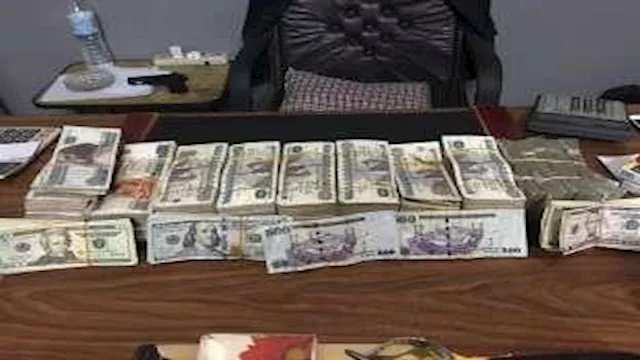 ضبط تاجري عملة - ارشيفية                          