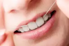 تنظيف الأسنان بالخيط و علاقة في الوقاية من السكتات الدماغية