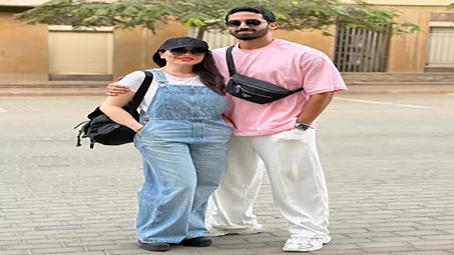 مي عز الدين وزوجها