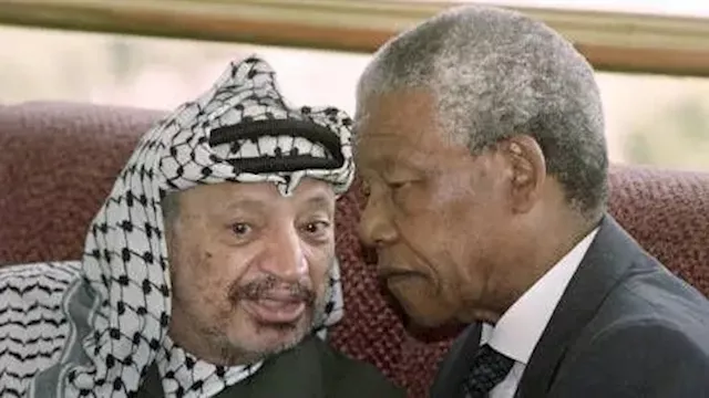 نيلسون مانديلا  وعرفات