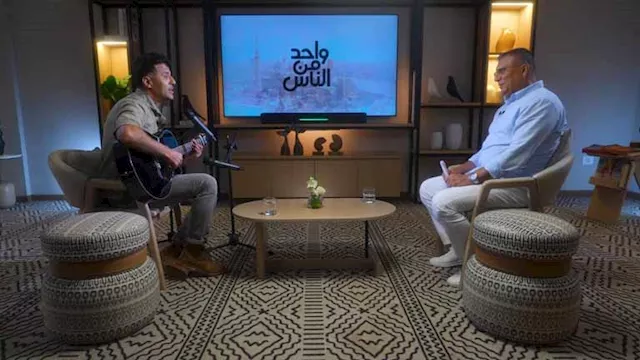 الإعلامي عمرو الليثي وحمزة نمرة