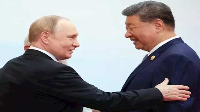 الرئيس الصيني شي جين بينج  وبوتين