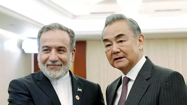 وانج يي و عباس عراقجي