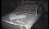 أضرارالمطر تلحق بك وبسيارتك عند تجاهل غسلهاi love you written on a dusty car
