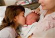 1410321925567_wps_29_Mother_with_newborn_baby_                                                                                                        