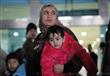اللحظات الأولى لعودة المصريين من ليبيا بمطار القاهرة (12)                                                                                                                                               