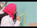تركيز كبير خلال الرسم على الجدارية في مبادرة حب بلدك بدسوق                                                                                                                                              