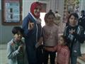 سيدة تصطحب أطفالها للانتخابات (2)                                                                                                                                                                       