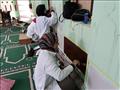 بالصور طالبات الفنية تبدأ تجميل مساجد واحة الخارجة في الوادي الجديد  (8)