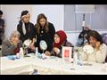 ورشة لتدريب محاربات السرطان على فنون التجميل