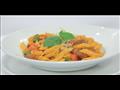 طريقة عمل مكرونة بالسجق و الطماطم