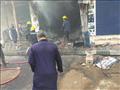 الدفاع المدني في مواجهة نيران حريق محل بالعمرانية