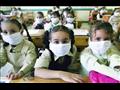 طلاب مصر يرتدون الكمامة