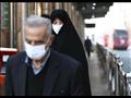 مواطنين عراقيين يرتدون الكمامات خوفا من كورونا
