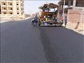 تنفيذ أعمال الطرق بعددٍ من مناطق الإسكان الاجتماعي بمدينة العاشر من رمضان