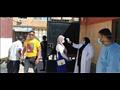 قياس درجات الحرارة لطلاب بورسعيد