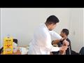 طالب يحصل على لقاح