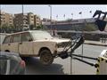 رفع سيارة متروكة ومتهالكة -ارشيف 