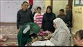 باسم وآيات يحتفلان داخل لجنة الانتخابات بأسيوط (3)