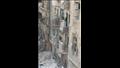 بالصور- انهيار أجزاء من عقار على منزل مجاور في الإسكندرية