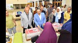 محافظ أسيوط يسلم كراسي كهربائية وماكينات خياطة  (16)