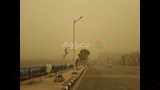 ارتداء الكمامات بسبب العاصفة باسيوط  