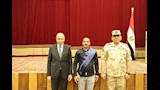 محافظ المنيا يُكرّم أسر الشهداء