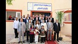 صورة تذكارية لوزيرة التنمية المحلية ومحافظ الوادي الجدي مع موظفي مركز معلومات المرافق