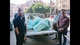 ضبط طن نخالة مدعمة وآلاف من زجاجات العطور مجهولة المصدر بالفيوم - صور