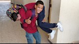  قصة طالب بسوهاج يحمل زميله ذي الإعاقة على كتفيه يوميًا