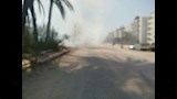 بالصور- السيطرة على حريق في نخيل وحشائش على الطريق الزراعي بالمنيا 