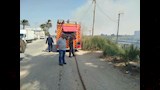 إخماد حريق نشب في حشائش على جانب الطريق بالمنيا  (1)